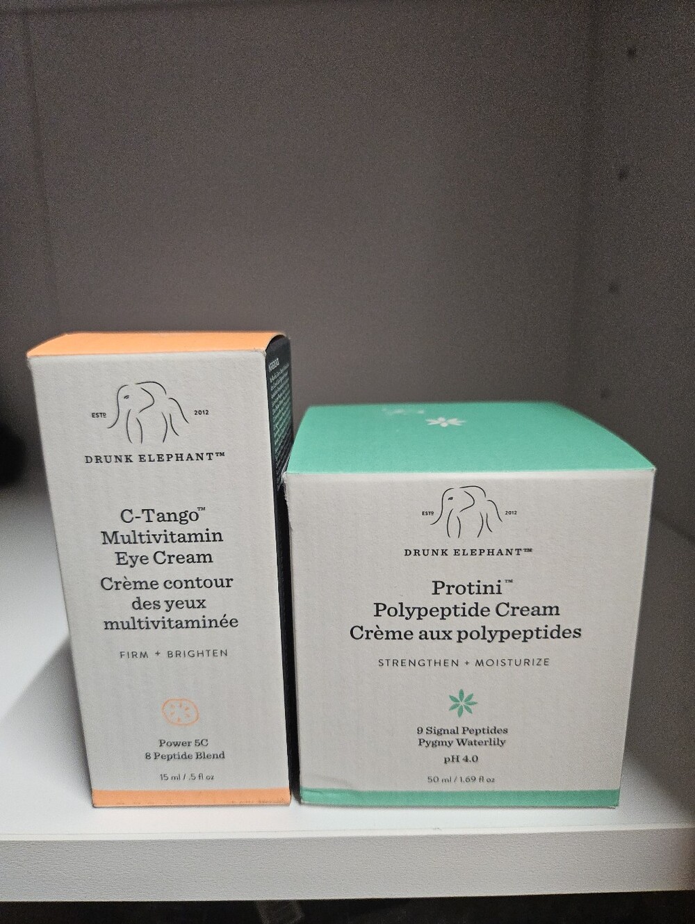 Drunk Elephant C-Tango (orange) & Protini (teal) Skincare Duo